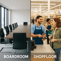 A boardroom table and an executive working on a shopfloor